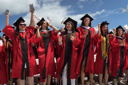 A group of Rutgers graduates celebrating